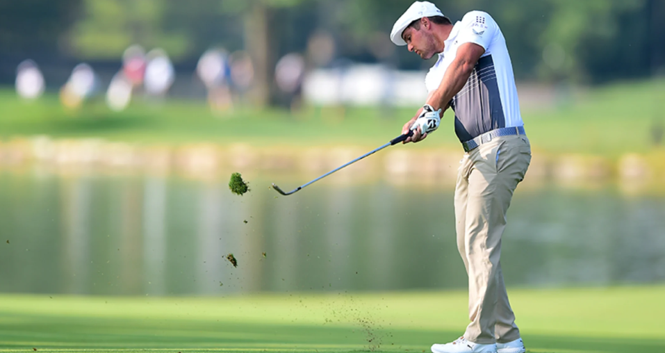 Golfer playing his shout low angle