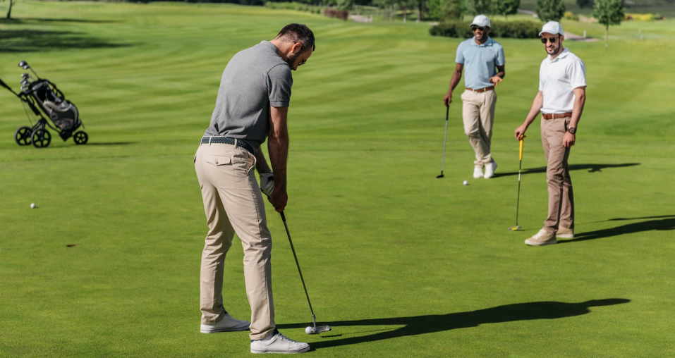 Golf player hoping to make the put and win the golf game bet