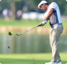 Golfer playing his shout low angle