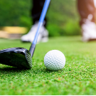  Low angle of Golf Club hitting the golf ball