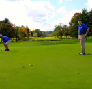 Golf player hoping to make the put and win the golf game bet