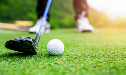  Low angle of Golf Club hitting the golf ball